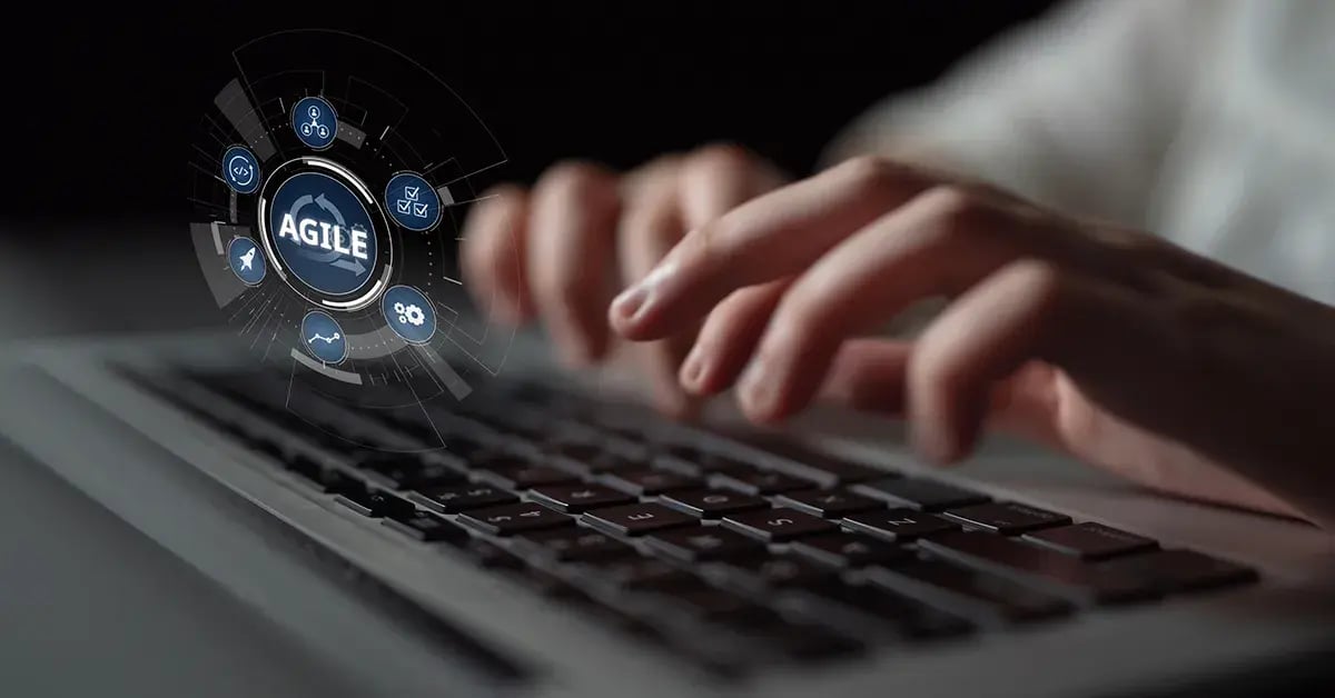 Hands on a laptop with Agile